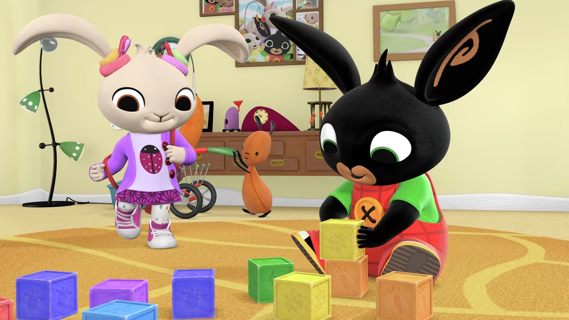 Bing and Coco play with coloured blocks