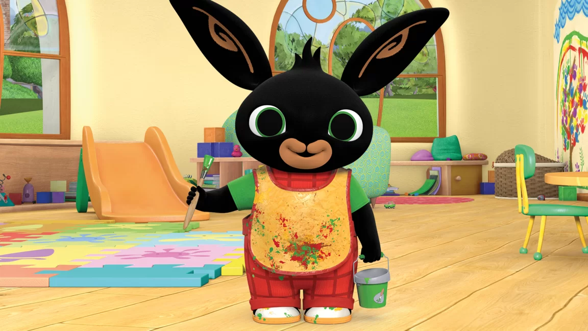 Bing in the creche with a paintbrush 